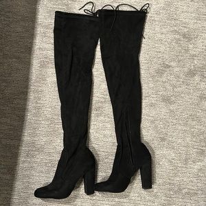 Lightly worn over the knee boots. They run slightly small.
